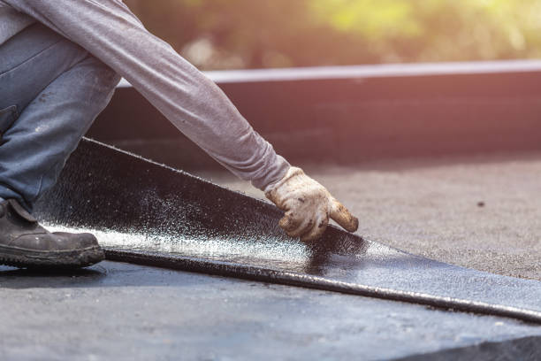 Professional Basement Waterproofing technician working in Bellwood, VA